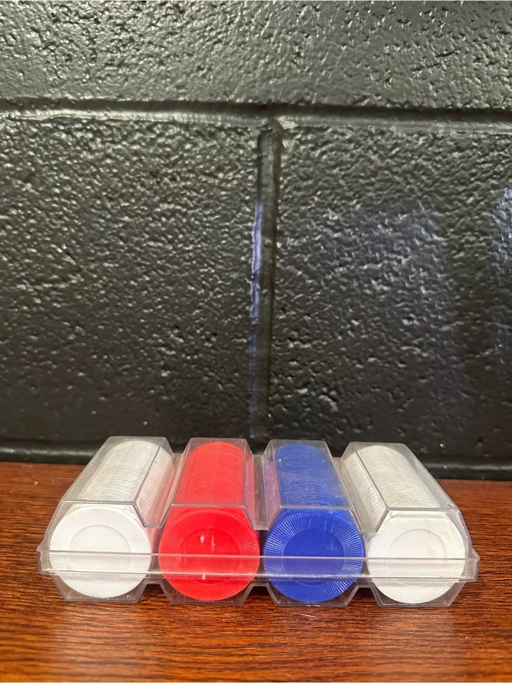 Red, Blue and White Poker Chips in Clear Case